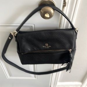 Kate Spade bag can be a shoulder bag and a cross the body bag as well